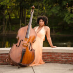 G S L (Gayelynn Sequoia Laura) outside with bass