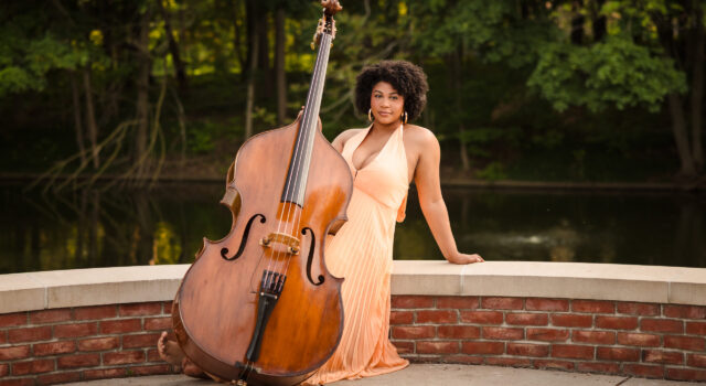 G S L (Gayelynn Sequoia Laura) outside with bass