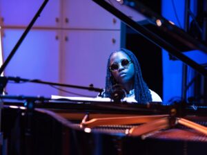 Sequoia “REDWOOD” Snyder playing piano