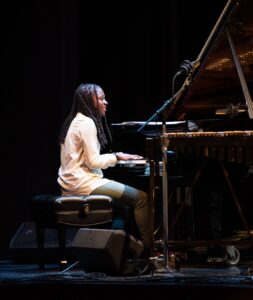 Sequoia “REDWOOD” Snyder on stage playing piano